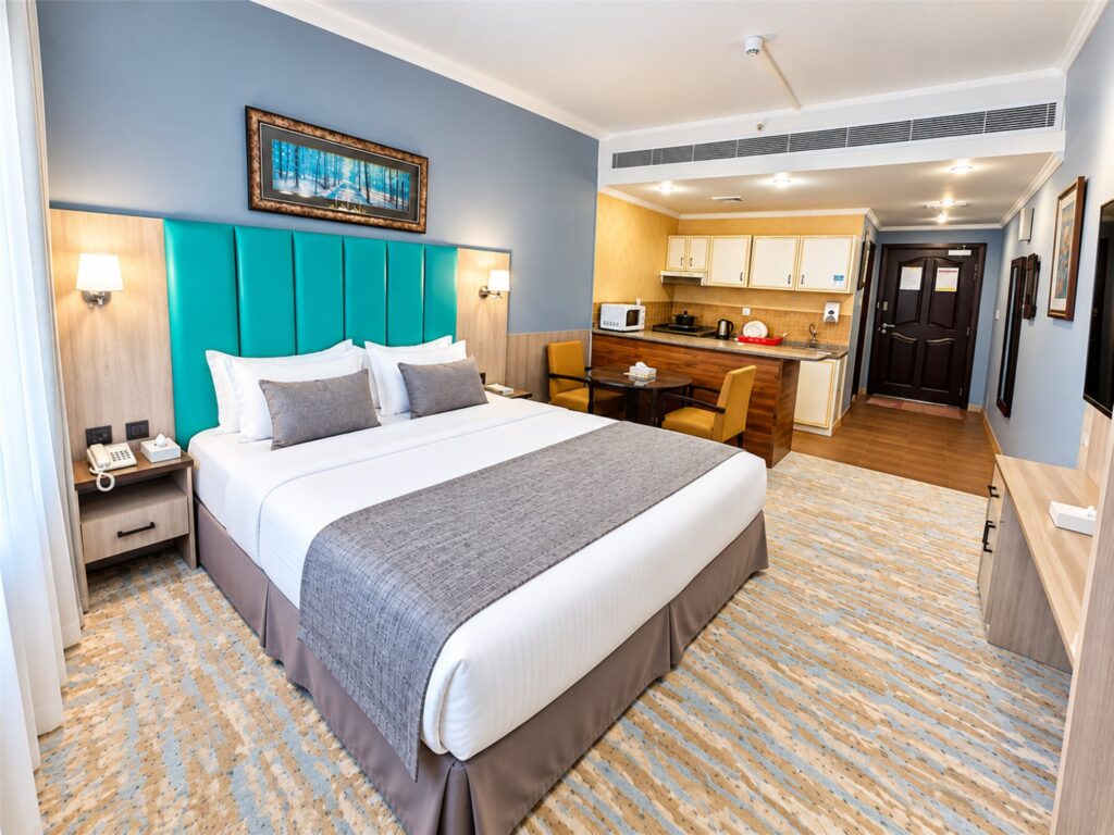 Double studio with a king bed and kitchen