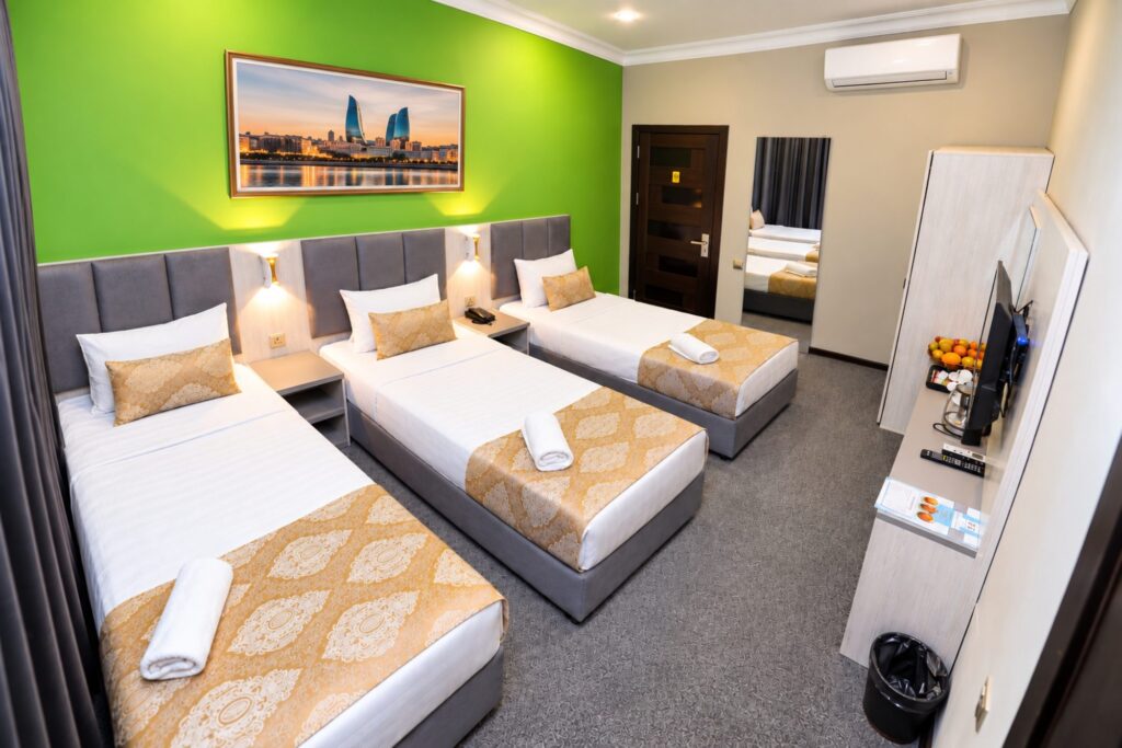 Triple room, beds in a row