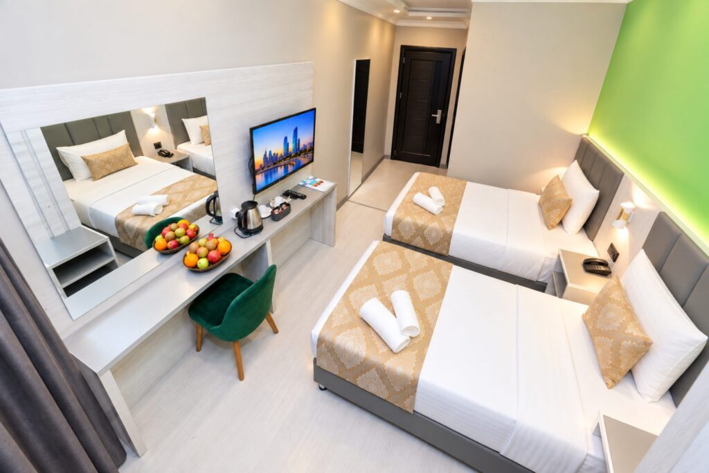 Twin room, desk and beds