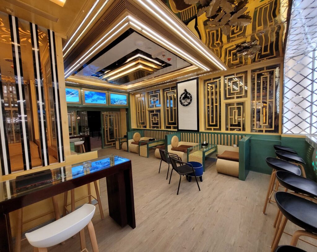 Lobby café seating at Camphor Hotel