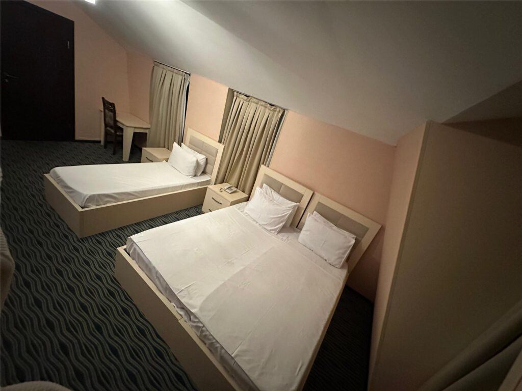 Triple room with a double and a single bed at Comfort Hotel Baku
